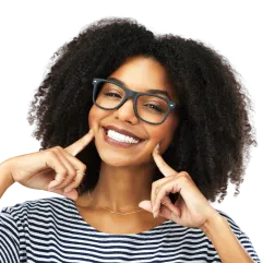 Adult patient smiling confidently after orthodontic treatment